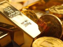 الذهب يتراجع ويتجه نحو خسارة أسبوعية