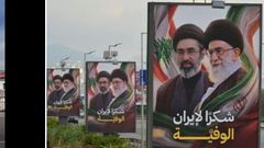 بيروت: إزالة لافتات مؤيدة لإيران قرب المطار واستبدالها بعبارة “لبنان أولًا”