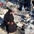 فلسطينيون يتفقدون الدمار في دير البلح ويشيّعون شهداء غارات الاحتلال على غزة