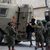 القدس: الاحتلال يعتقل مواطنة ويعتدي على أفراد عائلتها في مخيم قلنديا