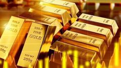 الذهب يتراجع والنفط يتجه نحو مكاسب أسبوعية