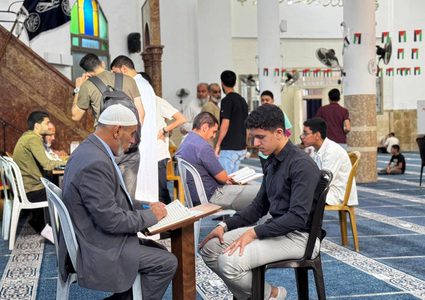 بالصور| أكثر من 3 آلاف حافظ وحافظة يسردون القرآن الكريم في مساجد نابلس