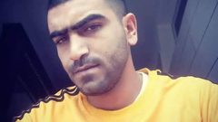 تسليم جثمان الشهيد شادي العجارمة في بيت أولا بعد احتجازه يومين