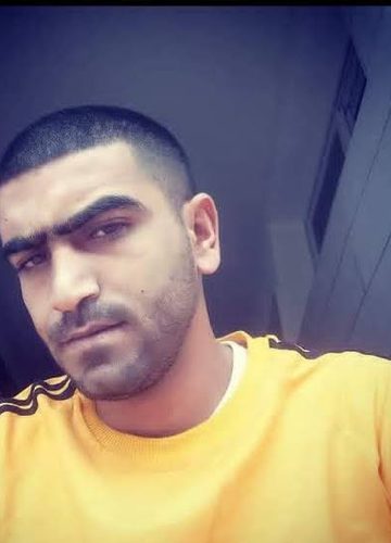 تسليم جثمان الشهيد شادي العجارمة في بيت أولا بعد احتجازه يومين